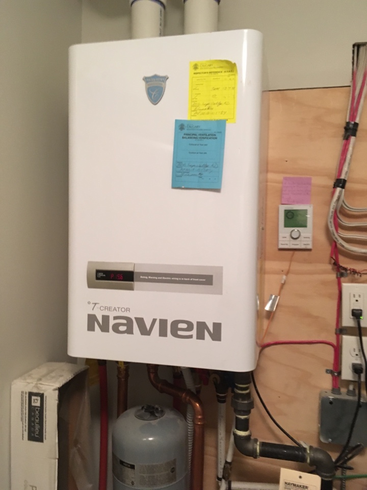 Saddle Ridge, AB - Navien boiler , cleaned combustion air filter and did boiler coil flush . Saddle Ridge, AB - Navien boiler , cleaned combustion air filter and did boiler coil flush .